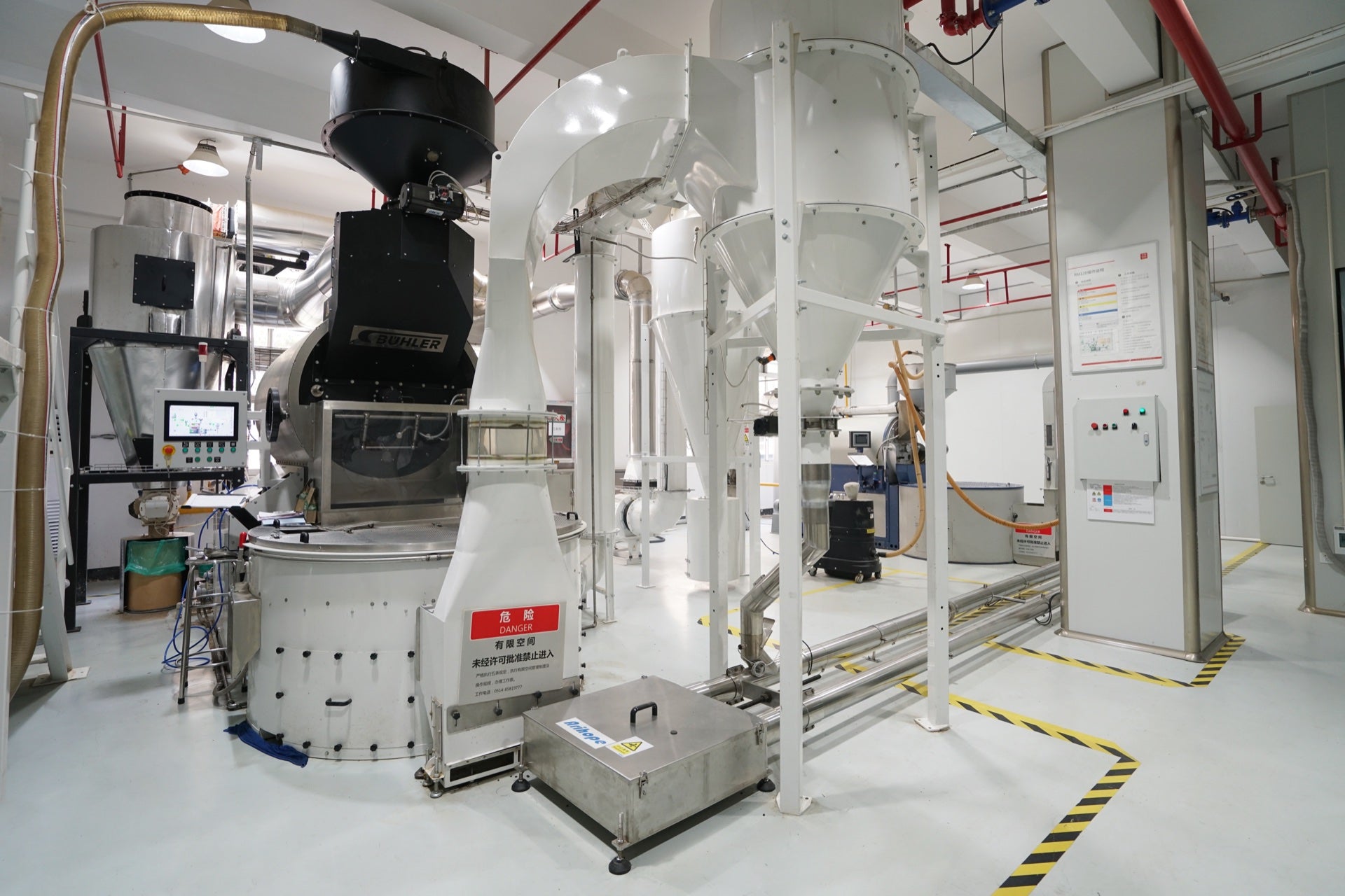 Coffee roasting equipment inside the CloudrayCoffee production facility